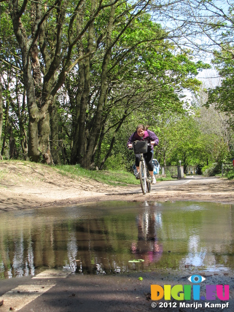 SX22312 Jenni about to ride through a puddle